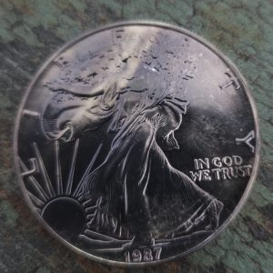 1987 SILVER EAGLE NICELY TONED BEAUTIFUL COIN